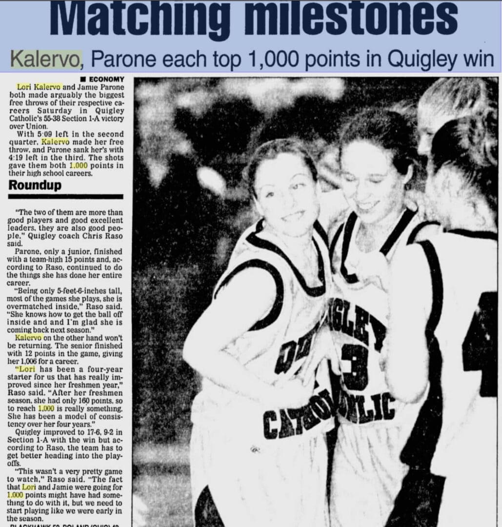 Two basketball players celebrating after a game.