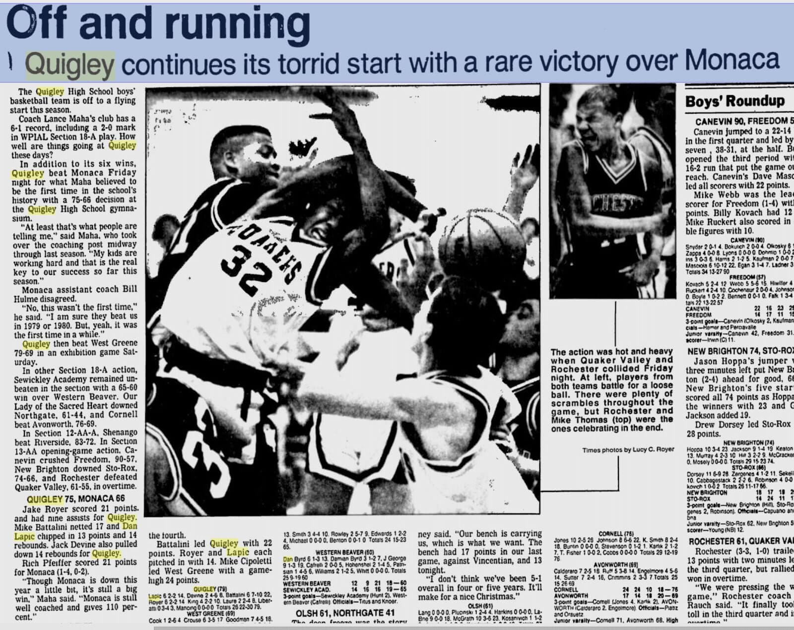 Basketball game action with players competing intensely.